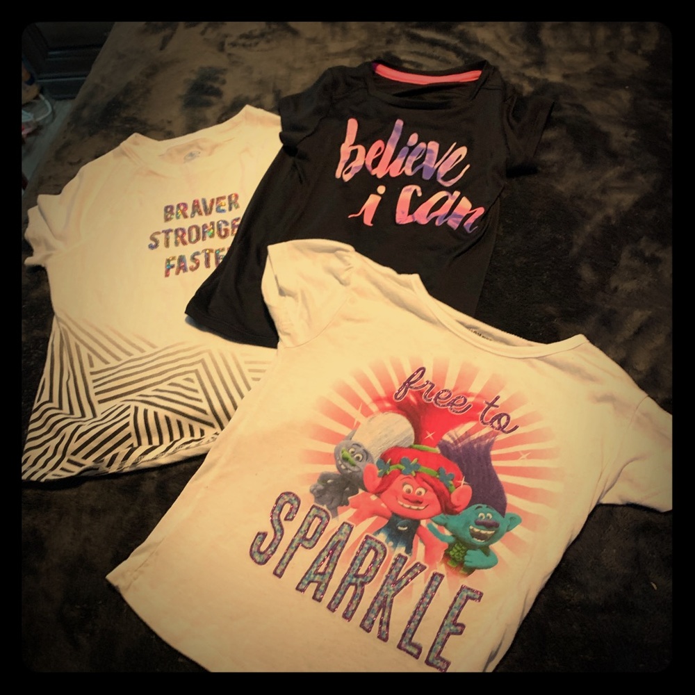 Little girl associated T-shirts